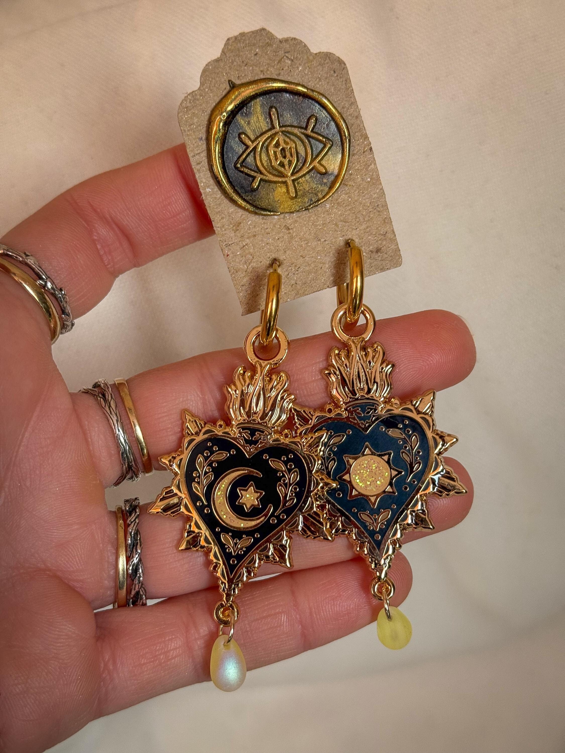 CELESTIAL HEART EARRINGS. Witch pendant earrings. Sacred heart. Gold earrings. Hoops. Surgical steel. Statement earrings. Jewellery. Jewelry