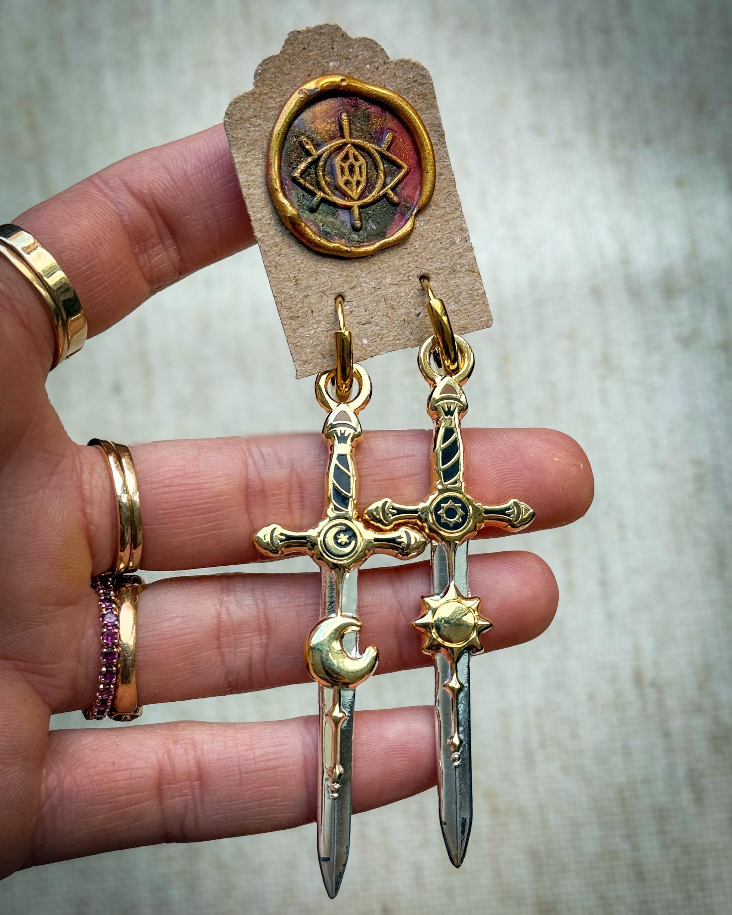 ASTARTE and APOLLO sword EARRINGS. Witch pendant earrings. Gold earrings. Hoops. Surgical steel. Statement earrings. Jewellery.