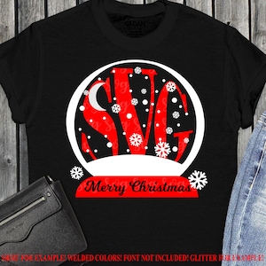 May include: A black t-shirt with a red and white snow globe design. The snow globe features the letters "SVG" and snowflakes. The text "Merry Christmas" is written in red below the snow globe.