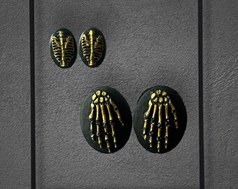 Halloween Resin Earrings – Gold Skeleton Hands & Rib Cage