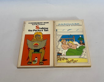 Vintage A Doonesbury Book G.B. Trudeau x 2 Stalking the Perfect Tan & As the Kid Goes For Broke