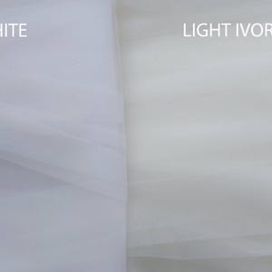May include: A side-by-side comparison of two sheer fabrics. The left section is labeled WHITE and features a bright, cool-toned white tulle. The right section is labeled LIGHT IVORY and displays a warmer, off-white, cream-toned tulle fabric.