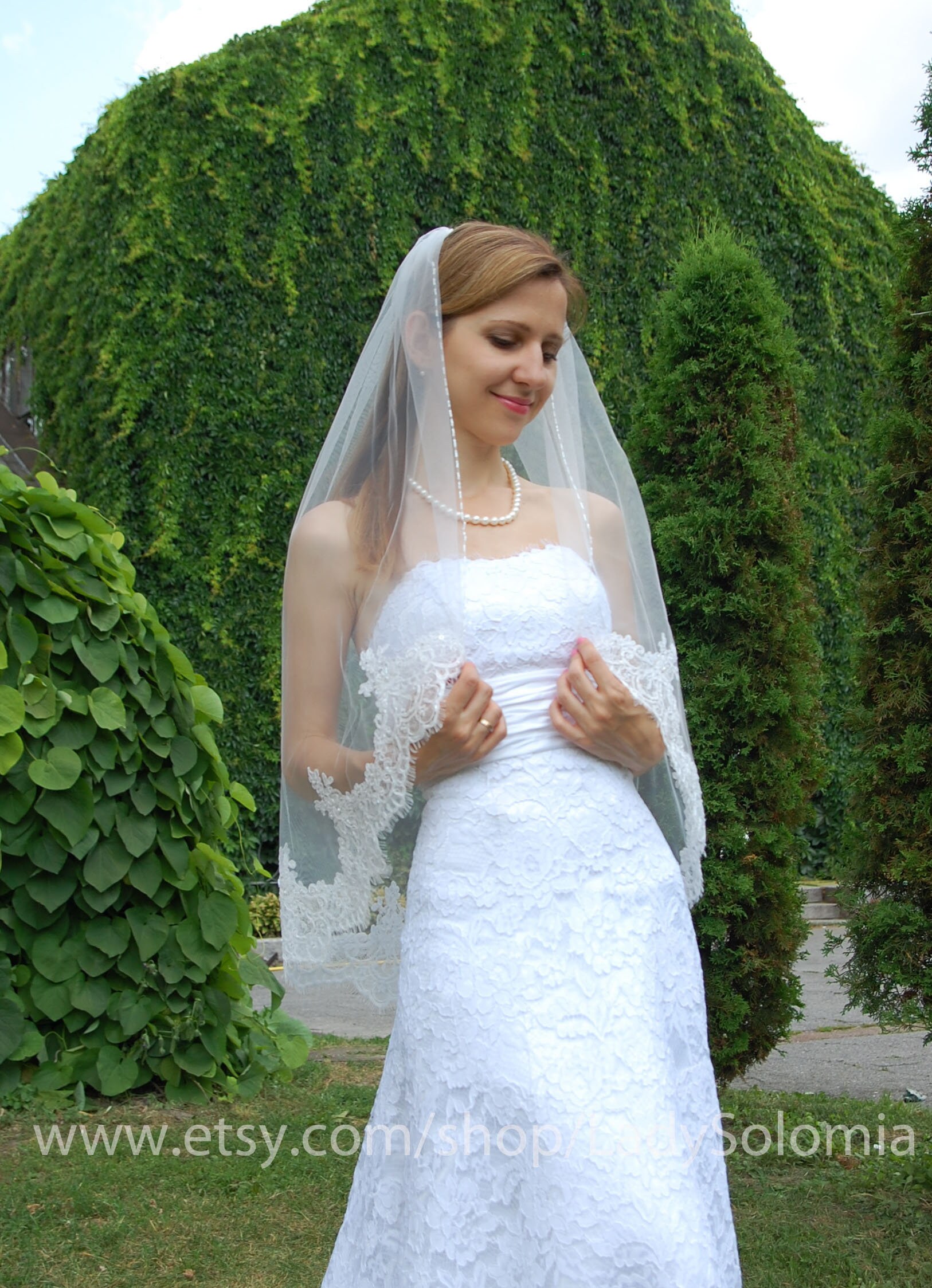 Fingertip Length Veil with Floral Embroidery Adornments V 3336