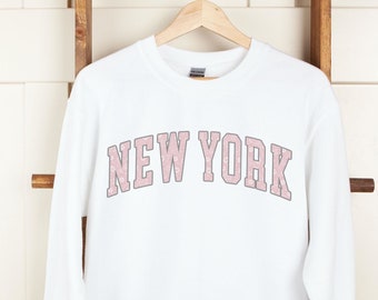 blush colored sweatshirt