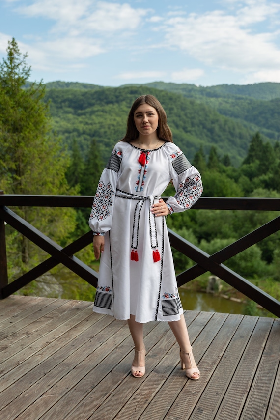 white embroidered midi dress Calla Embroidered Maxi Dress – Frock and Frill main image 0