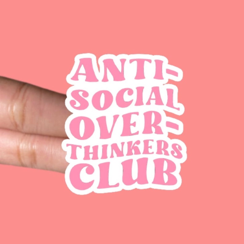 May include: Pink sticker with white outline that reads "ANTI-SOCIAL OVER-THINKERS CLUB".
