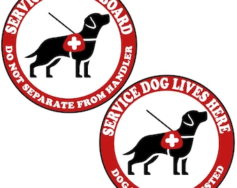 May include: Two circular stickers with a red border and white text. One reads "Service Dog on Board" and "Do Not Separate From Handler." The other says "Service Dog Lives Here" and "Dog May Not Be Vested." Each features a black dog silhouette.