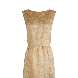 May include: A sleeveless, knee-length dress in a gold floral brocade fabric. The dress features a fitted waist and a scoop neckline. The fabric has a subtle sheen, giving it a luxurious appearance. The dress is suitable for formal events.