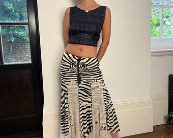 【archive】JOHN GALLIANO Newspaper Skirt INTO · INTO