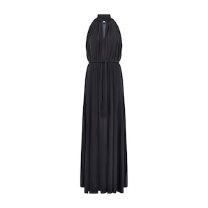 May include: A black maxi dress with a halter neckline and a tie at the waist.