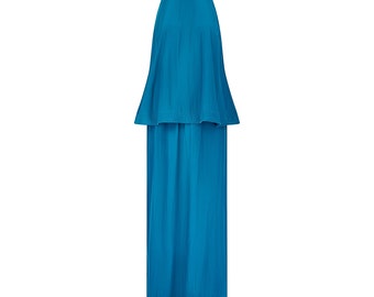 May include: A teal blue maxi dress with a halter neckline and a tiered skirt.
