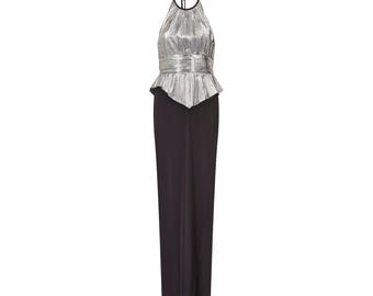 May include: A silver halter top with a black waistband and a black maxi skirt. The top has a pleated design and the skirt is fitted.
