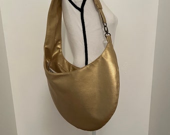 Gold vegan leather sling purse