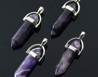 May include: Four silver and amethyst crystal point pendants. Each pendant features a silver bail and a crystal point with a purple hue.