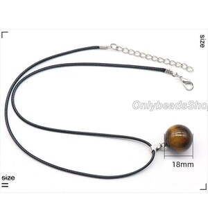 May include: A black leather cord necklace with a silver clasp and a 18mm round tiger's eye gemstone pendant. "OnlybeadsShop" and "size 18mm" are printed on the image.