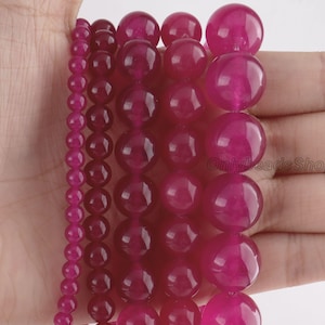 Runde Chalcedonperlen in Magenta, leuchtend pinkfarbene Edelsteinperlen für die Schmuckherstellung, Strang - STN0019
