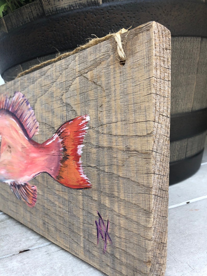 Red Fish ocean perch on reclaimed wood
