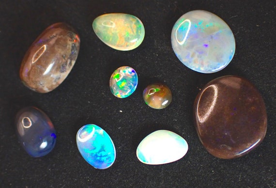 12.73ct Australian Opal Assorted Stones. 9 Pce