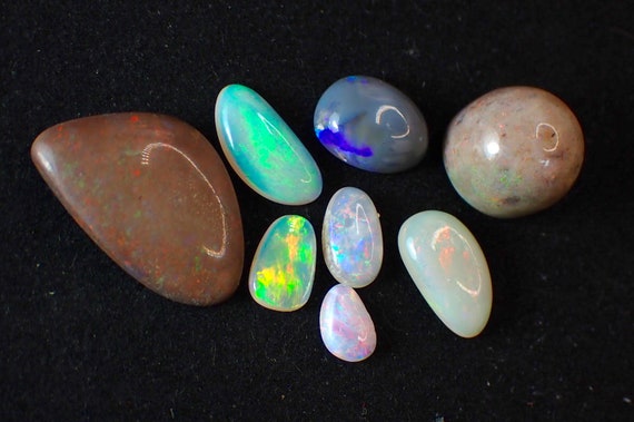 14.11ct Australian Opal Assorted Stones. 8 Pce