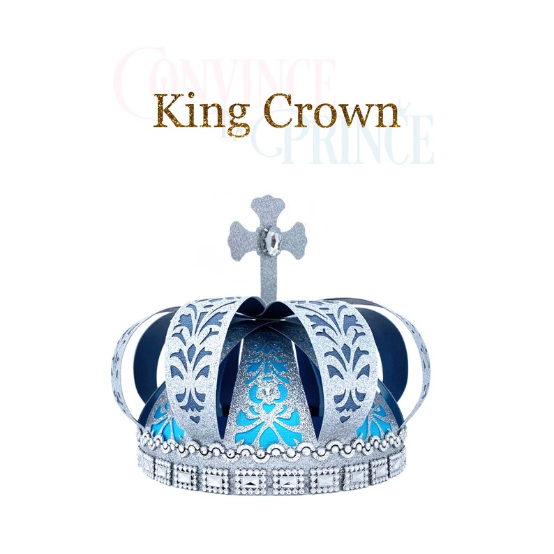 May include: A silver and blue king crown with a cross on top. The crown has a blue center and silver trim with a decorative pattern.