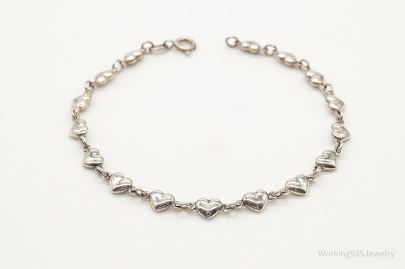 Silver Heart Bracelet: with Sterling Heart-Shaped Chain Links and Various Sized Hearts buy made from Sterling Silver in Love Bracelet Style 1354