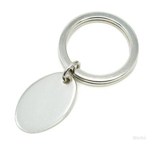 Portachiavi antico vintage in argento sterling con incisione