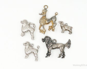 May include: Five silver and gold poodle charms. The charms are in various poses and sizes. The charms are perfect for adding a touch of whimsy to any jewelry project.