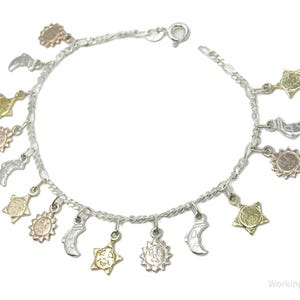 ヴィンテージ サンズ・ムーンズ・スターズ チャーム スターリング