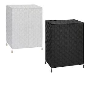 May include: Two woven storage bins, one white and one black. Both bins are square shaped and have a lid.