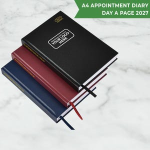 May include: Three A4 appointment diaries for the year 2027, stacked vertically. The top diary is black, the middle is burgundy, and the bottom is navy blue. Each features a ribbon bookmark and the text A4 APPOINTMENT DIARY DAY A PAGE 2027.