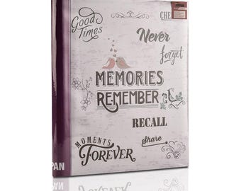 Może przedstawiać: Fioletowy album fotograficzny z białą okładką, na której widnieje tekst "Good Times", "Never Forget", "Memories Remember Recall", "Moments Forever" i "Share". Okładka zawiera również parę ptaków i serc.