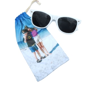 Your Photo Eyeglass and Sunglass Pouch doubles as a lens cleaner draw string case for your glasses