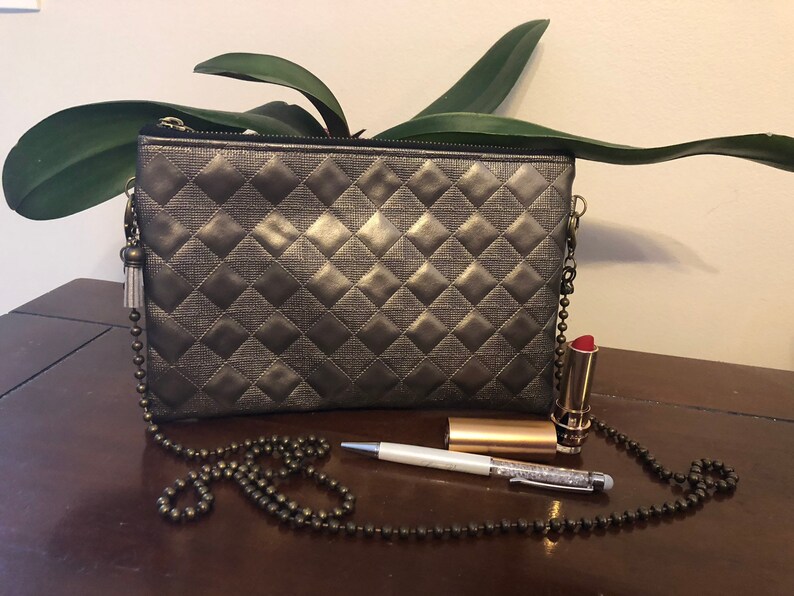 bronze clutch bag