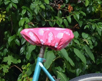 Waterproof bicycle saddle cover in coated fabric bicycle saddle protection pink pineapple