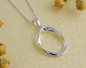 Collier cercle Mobius en argent sterling, bijoux boucle infini, pendentif cercle torsadé, collier Mobius pour femme, collier moderne géométrique