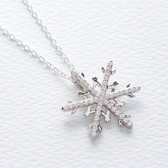 Snowflake Pendant 8-point with 9 Cubic Zirconia Sterling Silver - Includes Chain Snowflake Pendant 8-point with 9 Cubic Zirconia Sterling Silver - Includes Chain