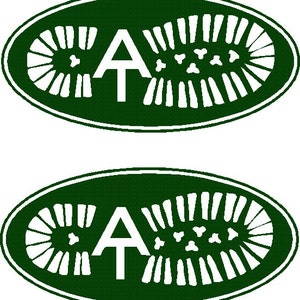 May include: Two green oval-shaped stickers with a white outline. Each sticker features a white footprint with a white letter "A" inside. The footprint has a tread pattern.
