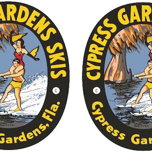 May include: A black and yellow circular logo with the text "Cypress Gardens SKIS Cypress Gardens, Fla."  The logo features a cartoon image of two people water skiing in front of a cypress tree.