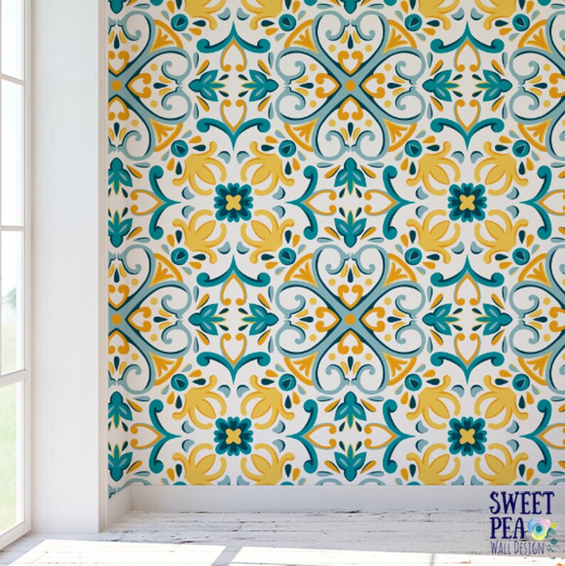 May include: A repeating pattern wallpaper with a white background and a blue and yellow geometric design. The pattern features a repeating motif of stylized flowers and leaves.