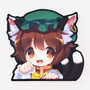 May include: A die-cut sticker featuring a cartoon character with brown hair, cat ears, and a green hat. The character has large, expressive eyes and is wearing a yellow and red outfit. The sticker has a black border and a white background.