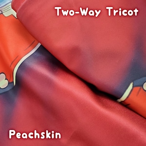 May include: Two fabric swatches, one red and one peach, with the words "Two-Way Tricot" and "Peachskin" printed on them.
