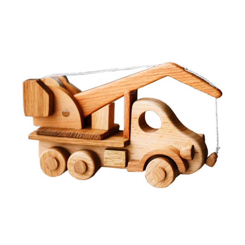 A Car Carrier Crane With Magnet And Three Dice Wooden Toy Image 0