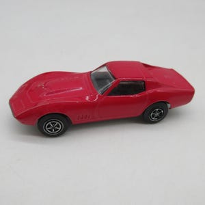 1969 Kenner Zip Strip Pocket Pak Red / Pink Corvette Stingray -  Redline Hot Wheels -  Diecast Lesney Superfast Vintage