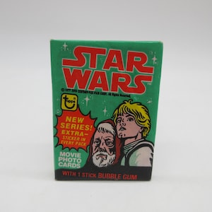 1977 Star Wars Series 1 Topps Wax Pack - Nieuw - Factory Sealed - Topps - Kans op C3PO-fout Gold Rod - Niet-sportkaart - Non-sport S2