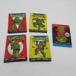 1989 Teenage Mutant Ninja Turrles Wax Pack - Komplettes Set von 4 + Movie Pack - Neu - Versiegelt - Topps - Non-Sportkarte - Nonsport