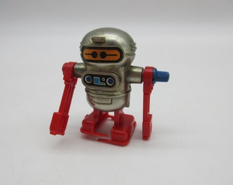 Mini robot coquin TOMY de 1977 - À remonter par TOMY - Fonctionne ! Jouet rare - Perdu dans l'espace