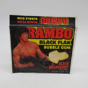 1985 RAMBO Black Flak Bubble Gum - Anabasis - Black Raspberry - Pacote de cera - Novo - Lacrado - Topps - Cartão não esportivo - Não esportivo