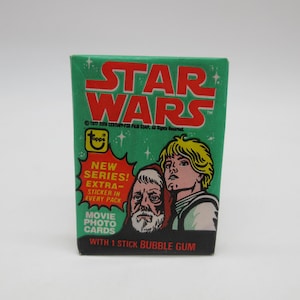 1977 Star Wars Series 1 Topps Wax Pack - Nieuw - Factory Sealed - Topps - Kans op C3PO-fout Gold Rod - Niet-sportkaart - Non-sport S1