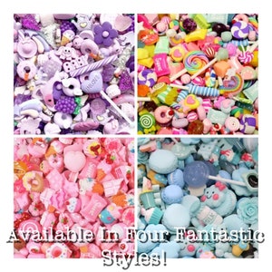 May include: A collage of four squares filled with colorful resin charms. The top left square features purple charms, the top right has candy-themed charms, the bottom left is pink, and the bottom right is blue. Text at the bottom reads "Available In Four Fantastic Styles!"