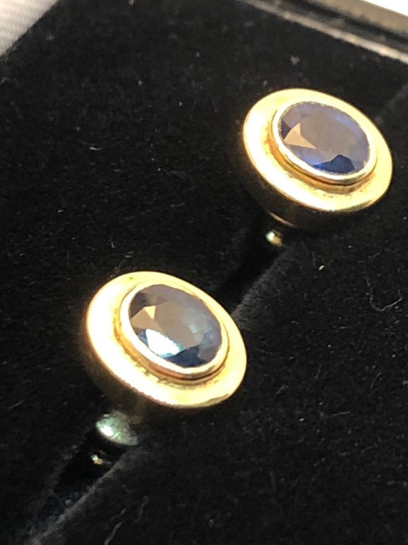 18 carat gold blue sapphire stud earrings 8 millimetres long